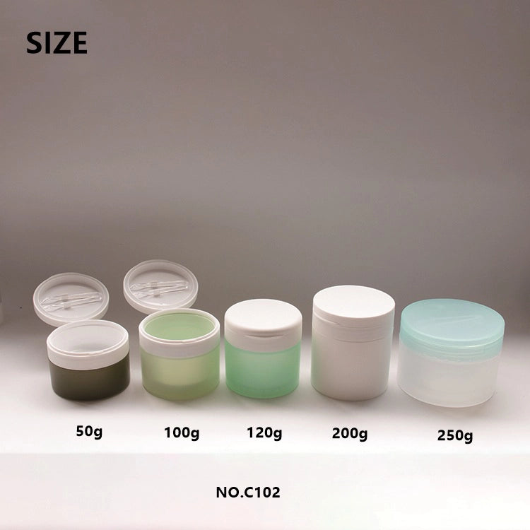 Sleek Cylindrical Empty Cosmetic Cream Jar with Hinged Spatula in Lid Chamber for Clay Face Mask