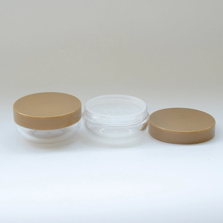 56.6mm 透明空蜜粉罐，搭配土卡其色蓋子和獨特弧形碗底